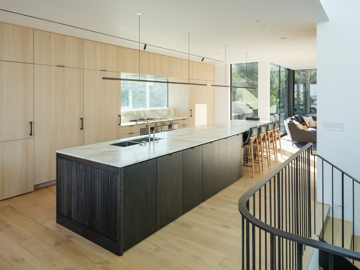 Kitchen island in oak and blackened timber
