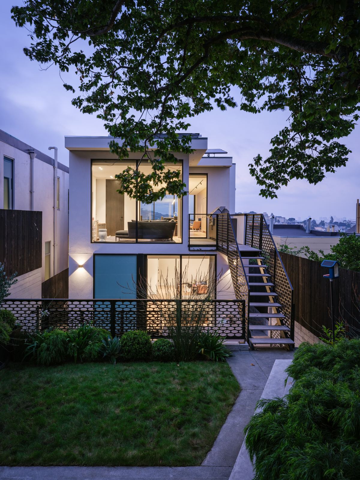 Rear elevation at dusk from the garden